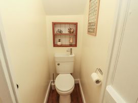 A bathroom with a toilet and sink at East View in Ravenstonedale near Kirkby Stephen