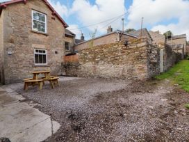 An outdoor area with a table and chairs at East View in Ravenstonedale near Kirkby Stephen