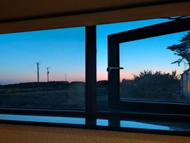 A window view showing sky and power lines at The Rookery in Rosslare Harbour, County Wexford