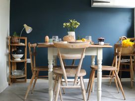 A kitchen with a table set for breakfast at The Old Post Box