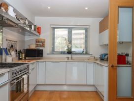 A kitchen with a sink and stove at 26 Dart Marina
