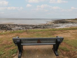 A view of the sea from a bench at Sea Folly in Porthcawl