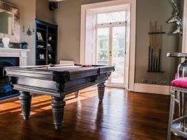 A game room with a pool table at St Anne's Manor in Torquay