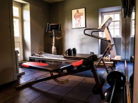 A gym with exercise equipment at St Anne's Manor in Torquay