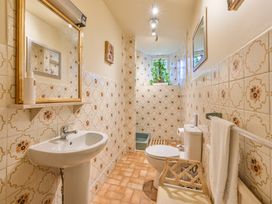 A bathroom with sink and toilet at Muntham Luxury Town House with Hot Tub in Torquay