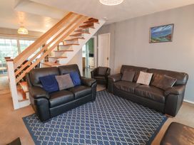 A living room with two sofas and an armchair at Cromer Holiday Home in Cromer