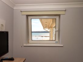 A window with a view of the beach at Beachside in 