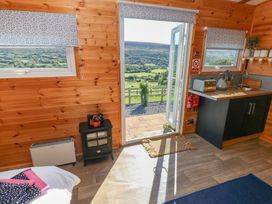 A room with a kitchen area and views at Sychnant Farm Retreat Llanedi near Pontarddulais