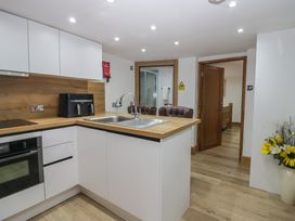 A kitchen with a sink and appliances at Park View Studio in Ambleside