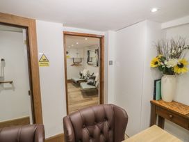 An office space with a chair and table at Park View Studio in Ambleside