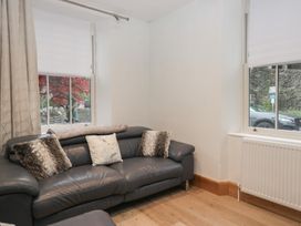 A living room with a sofa and window at Park View in Ambleside