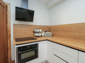 A kitchen with a toaster and oven at Park View in Ambleside