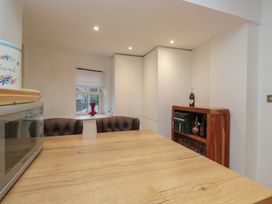 A kitchen with a table and chairs at Park View in Ambleside