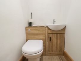 A bathroom with a toilet and sink at Park View in Ambleside
