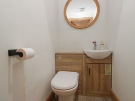 A bathroom with a toilet and washbasin at Park View in Ambleside
