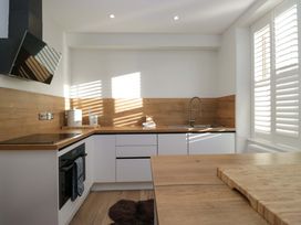 A kitchen with a sink and stove at Park View in Ambleside