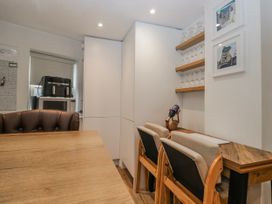 A dining room with a table and chairs at Park View in Ambleside