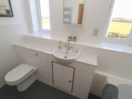 A bathroom with a sink and toilet at 12 Boswedden Terrace in St Just