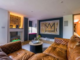 A living room with a sofa and coffee table at Manor Farm House in Merton near Bicester
