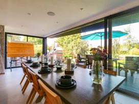 A dining room with a table and chairs at Manor Farm House in Merton near Bicester