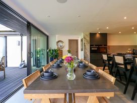 A dining room with a table and chairs at Manor Farm House in Merton near Bicester