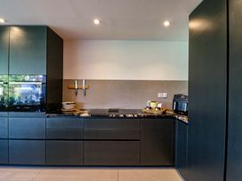 A kitchen with a countertop and appliances at Manor Farm House in Merton near Bicester