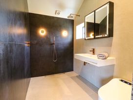 A bathroom with a shower, sink, and toilet at Manor Farm House in Merton near Bicester