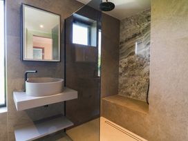 A bathroom with a sink and shower at Manor Farm House in Merton near Bicester