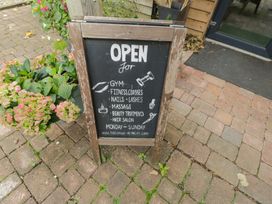 A sign indicating services at The Lodge Retreat in Whiteparish