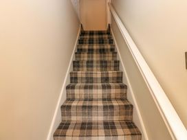 A staircase with carpet at Milford in Great Corby, Wetheral