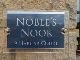 A sign for Noble's Nook at 9 Harcar Court in Seahouses