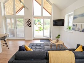 A living room with a sofa and coffee table at Lodge 12 in South Hykeham