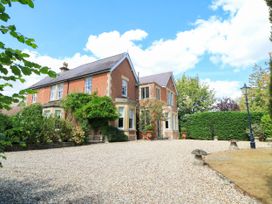 An outdoor view of a house with garden at The Mount in Chippenham