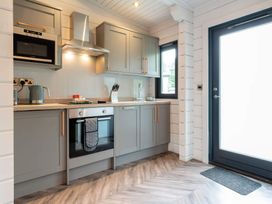 A kitchen with cabinets and appliances at Askrigg in Aysgarth
