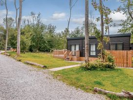 A house with a deck and pathway at Somersby (Pet) Louth