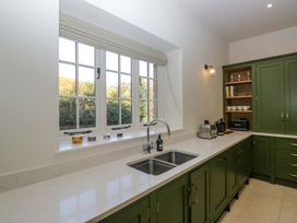 A kitchen with sink and countertop at The Old Bunkhouse in Grasmere