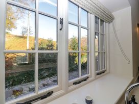 A kitchen window with a view of the landscape at The Old Bunkhouse in Grasmere