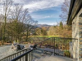 An outdoor space with chairs and gravel at The Old Bunkhouse in Grasmere