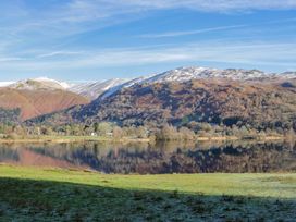 A landscape with mountains and a lake at The Old Bunkhouse in Grasmere