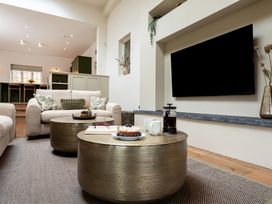 A living room with a coffee table and sofa at The Old Bunkhouse in Grasmere