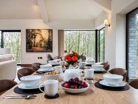 A dining room with a table set for a meal at The Old Bunkhouse in Grasmere