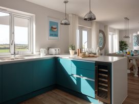 A kitchen with a sink and countertop at Polview in Newquay