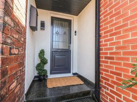 An entrance with a front door and doormat at Falcon Luxe in Whitby