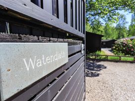 A gate with a sign at Watendlath in Keswick
