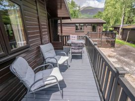 An outdoor area with chairs and a table at Watendlath in Keswick