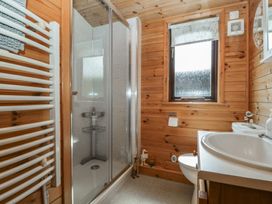 A bathroom with shower and sink at Watendlath in Keswick