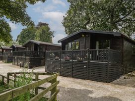 Log cabins with porches in a natural setting at Watendlath, Keswick