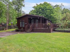 A cabin with deck and garden at Costapacket, Grasmere 12, White Cross Bay near Windermere