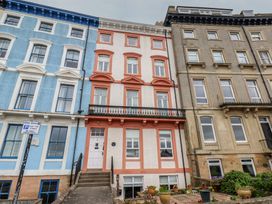 A building with colored facades and windows at The Studio on the Crescent Whitby