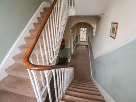 A staircase and corridor view at The Studio on the Crescent Whitby